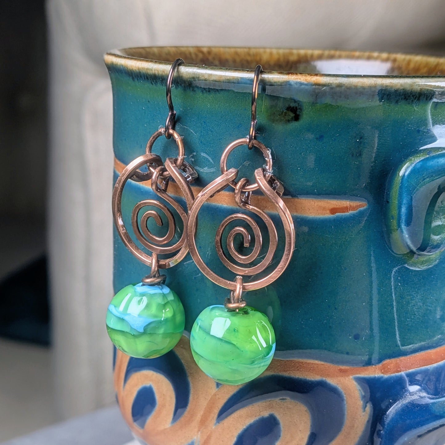 Green Lampwork Beaded Earrings with Dangling Spirals