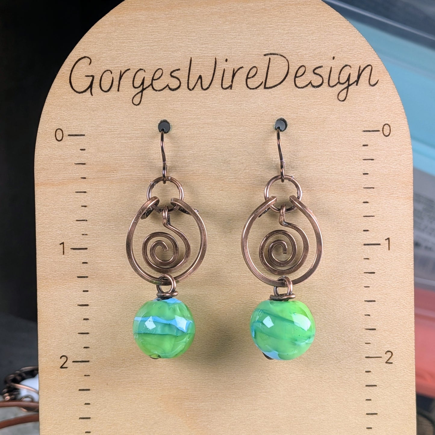 Green Lampwork Beaded Earrings with Dangling Spirals