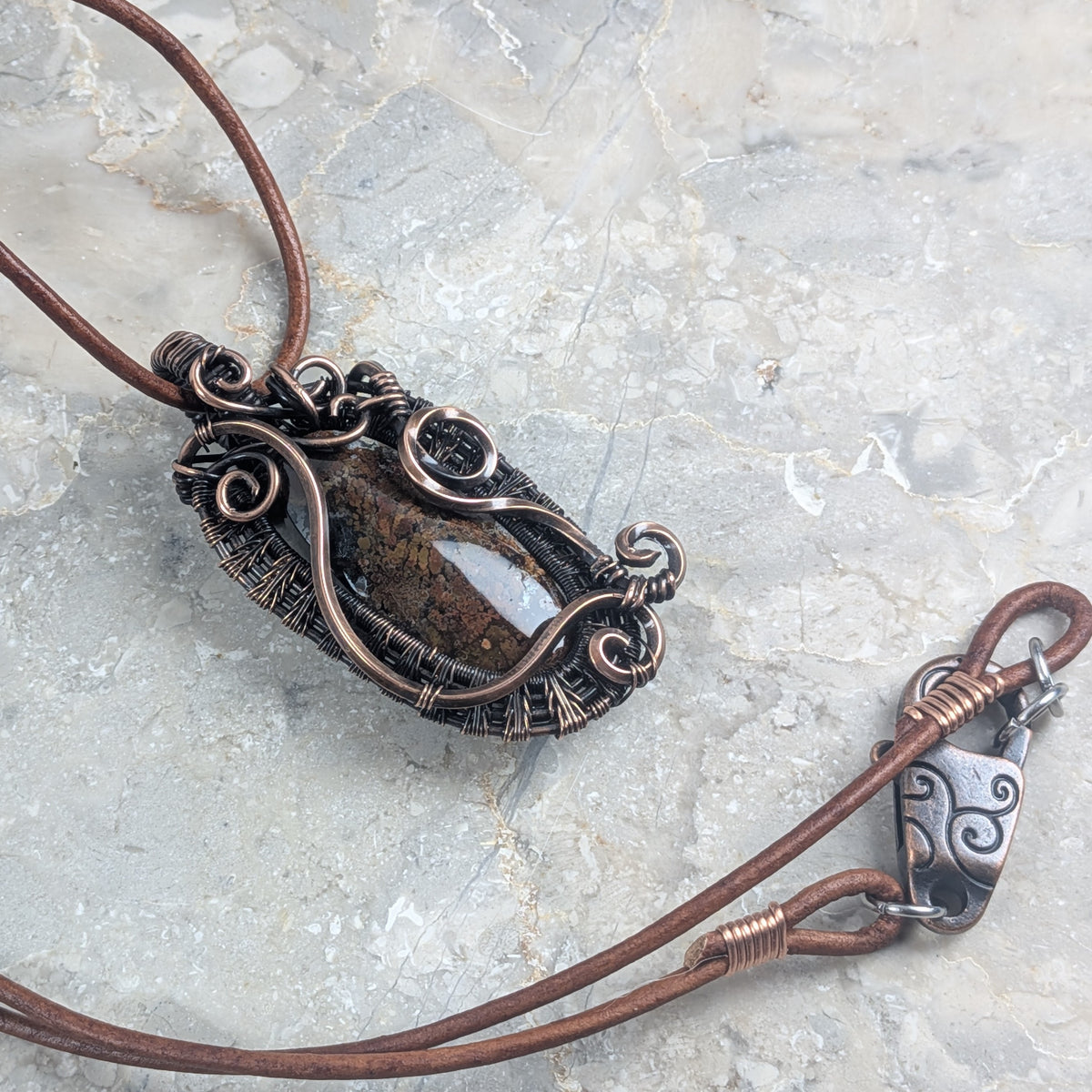 Swirling Red Sands: Scenic Moss Agate in Copper